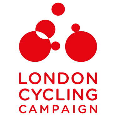 A series of red circles overlapping to form an abstract outline of a cyclist on a bicyle